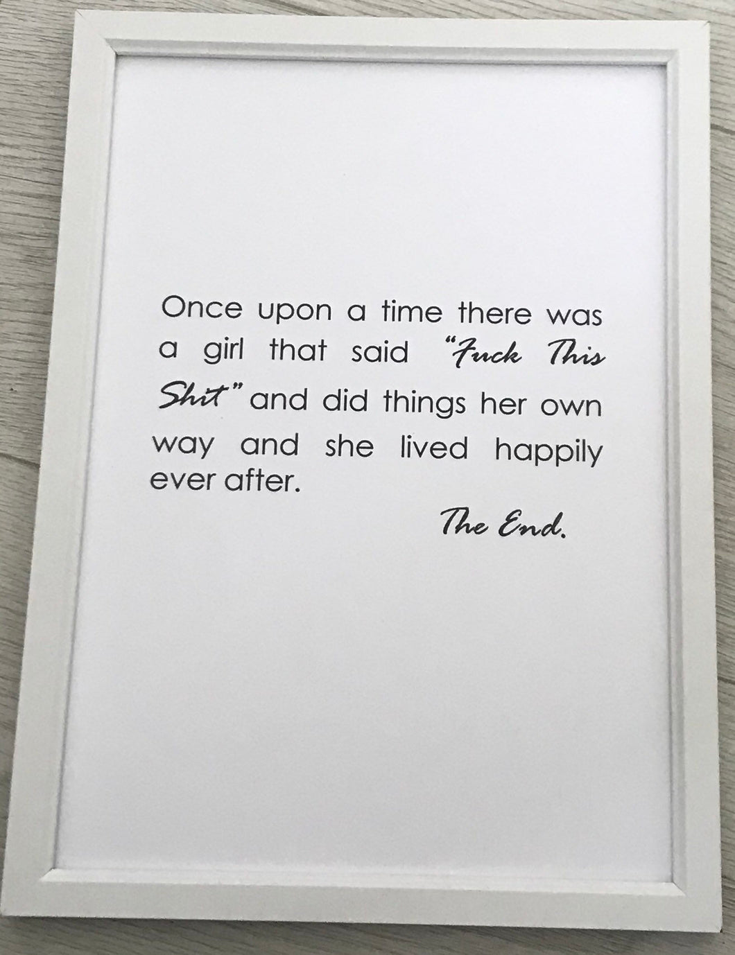 a4 white card, with wording 