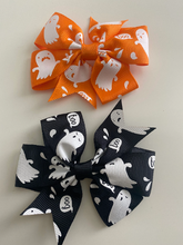 Load image into Gallery viewer, halloween bows for girls. orange with white ghosts and black with white ghosts
