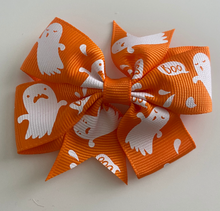 Load image into Gallery viewer, orange girls halloween bow with white ghosts pattern
