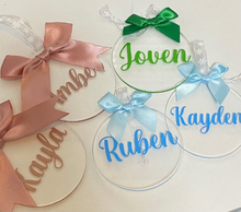 Load image into Gallery viewer, 10cm clear acrylic disc with white ribbon to hang. blue bow and ribbon
